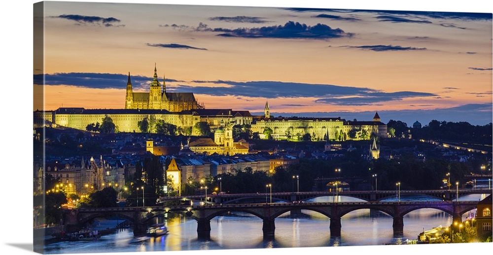 Czech Republic, Prague. Prague Castle, Pazsky Hrad, and the Vltava River at sunset from the Vysehrad.