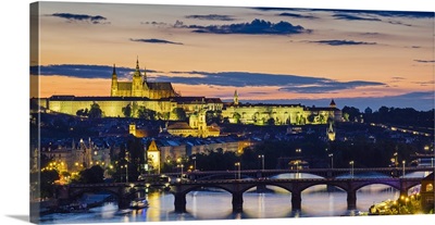 Prague Castle, Pazsky Hrad, and the Vltava River at sunset from the Vysehrad