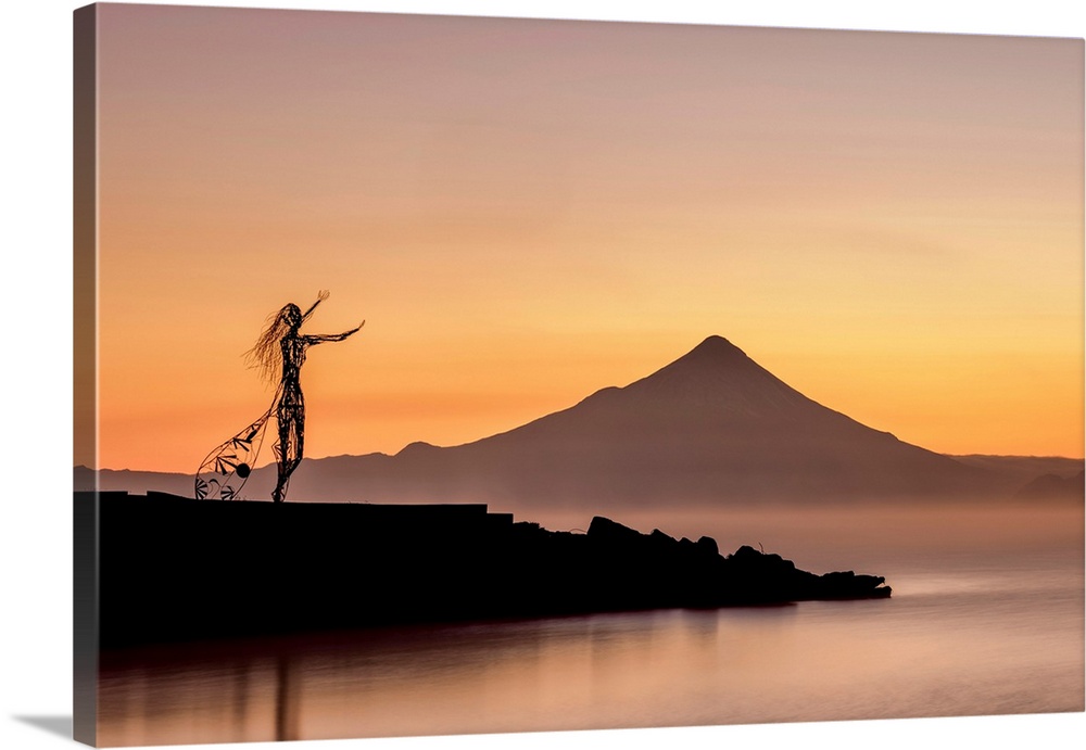 Princess Licarayen Sculpture and Osorno Volcano at dawn, Puerto Varas, Llanquihue Province, Los Lagos Region, Chile.