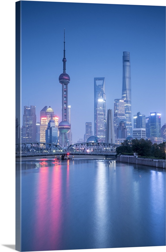 Pudong skyline across the Suzhou Creek and Waibaidu bridge, Shanghai, China.