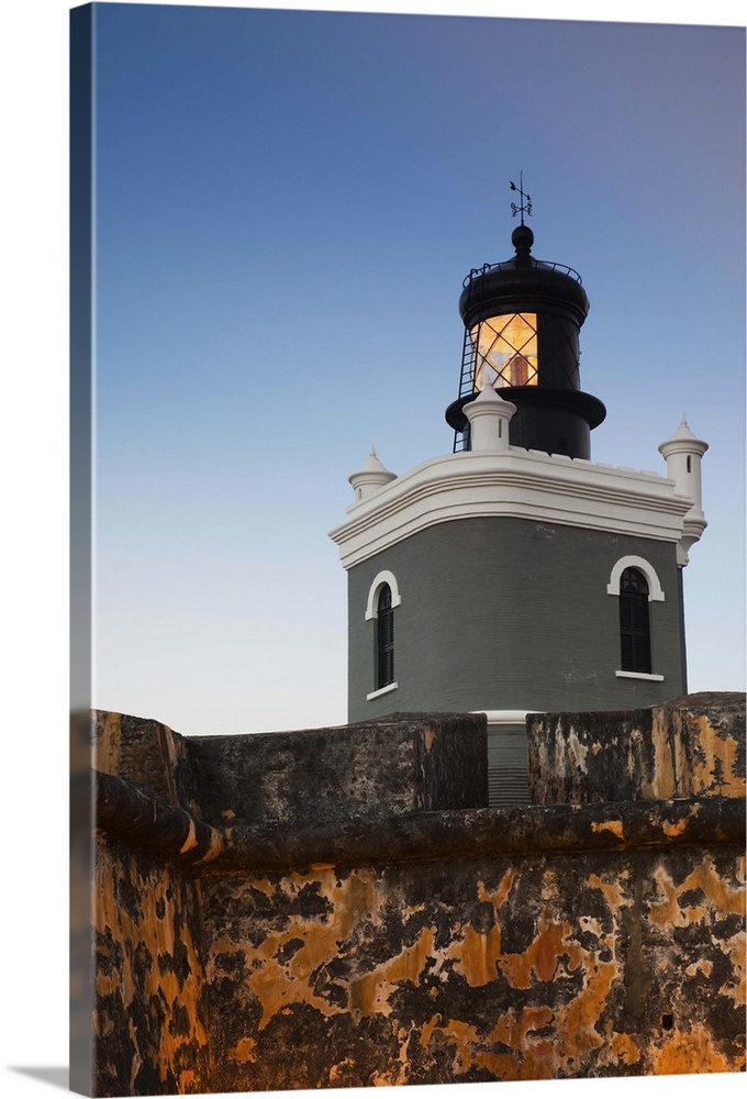 Puerto Rico, San Juan, Old San Juan, San Felipe del Morro Fort, El Morro, fortress walls and lighthouse, dusk