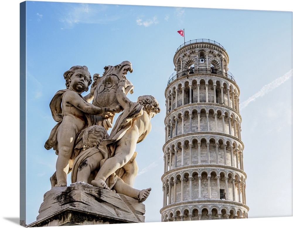 Putti Fountain and Leaning Tower, Piazza dei Miracoli, Pisa, Tuscany, Italy.