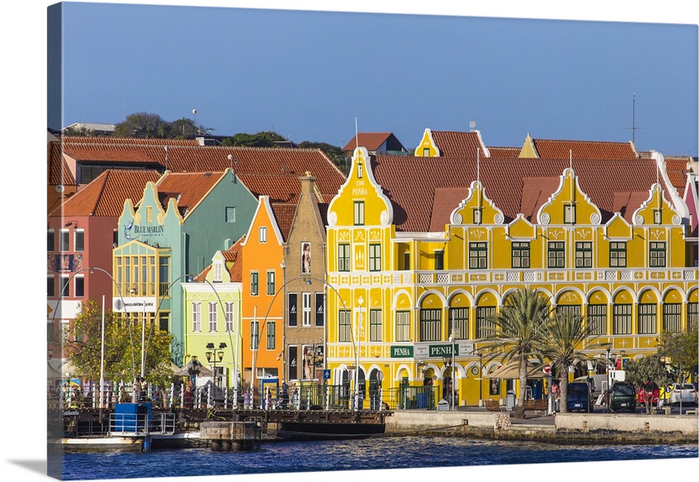 Curacao, Willemstad, Queen Emma pontoon bridge and colonial merchant houses lining Handelskade along Punda's waterfront.
