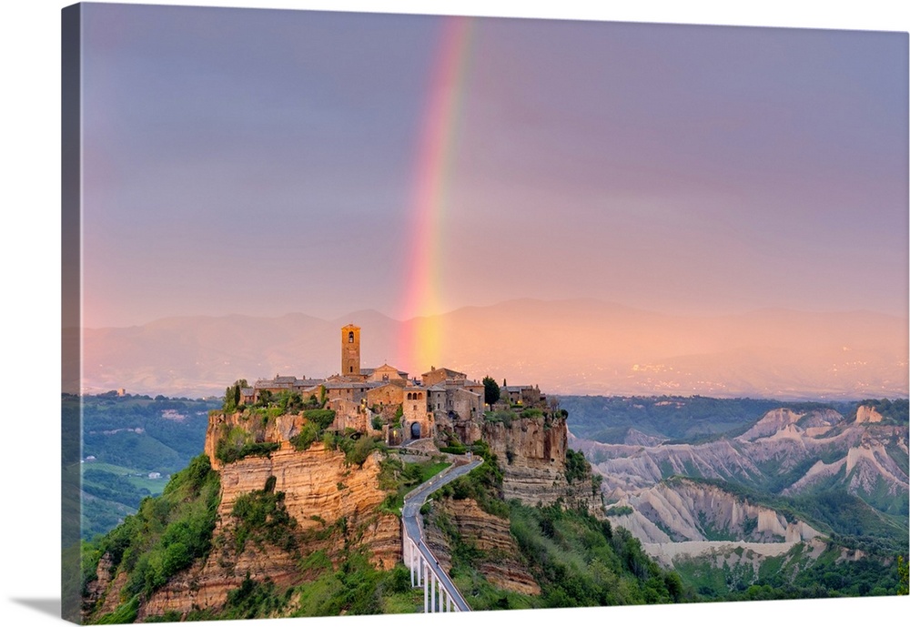Rainbow over Civita di Bagnoregio at sunset, Bagnoregio, Lazio, Italy, Europe.