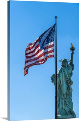 Rear Side Of Statue Of Liberty With US Flag, Liberty Island, New York, USA