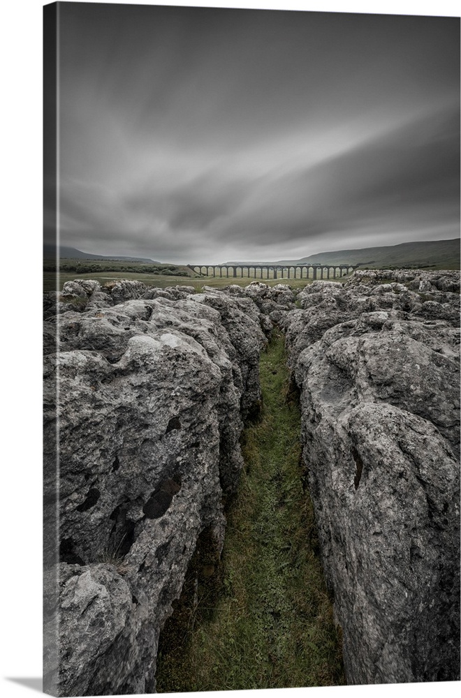 Ribblehead Viaduct and limestone pavement, Ribble Valley, Yorkshire Dales National Park, North Yorkshire, England, UK.