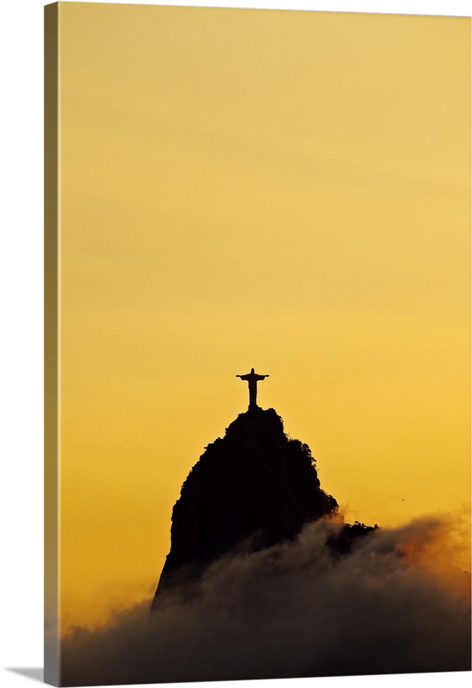 Brazil, City of Rio de Janeiro, Sunset view of the Christ the Redeemer and Corcovado Mountain.