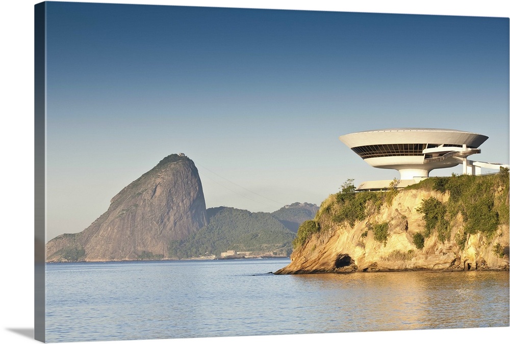 South America, Rio de Janeiro, Niteroi, Oscar Niemeyer's Contemporary Art Museum (MAC Niteroi) in the late afternoon light...
