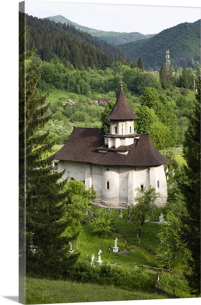 Romania, Bucovina, Sucevita. The church and cemetery attached to Sucevita Monastery.