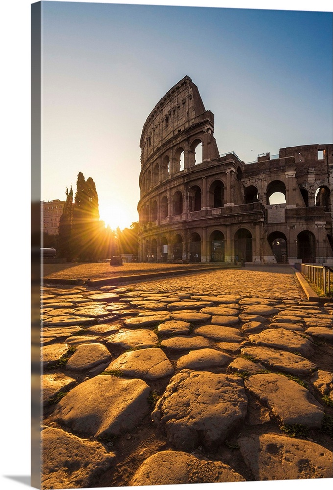 Rome, Lazio, Italy. Colosseum at summer sunrise.