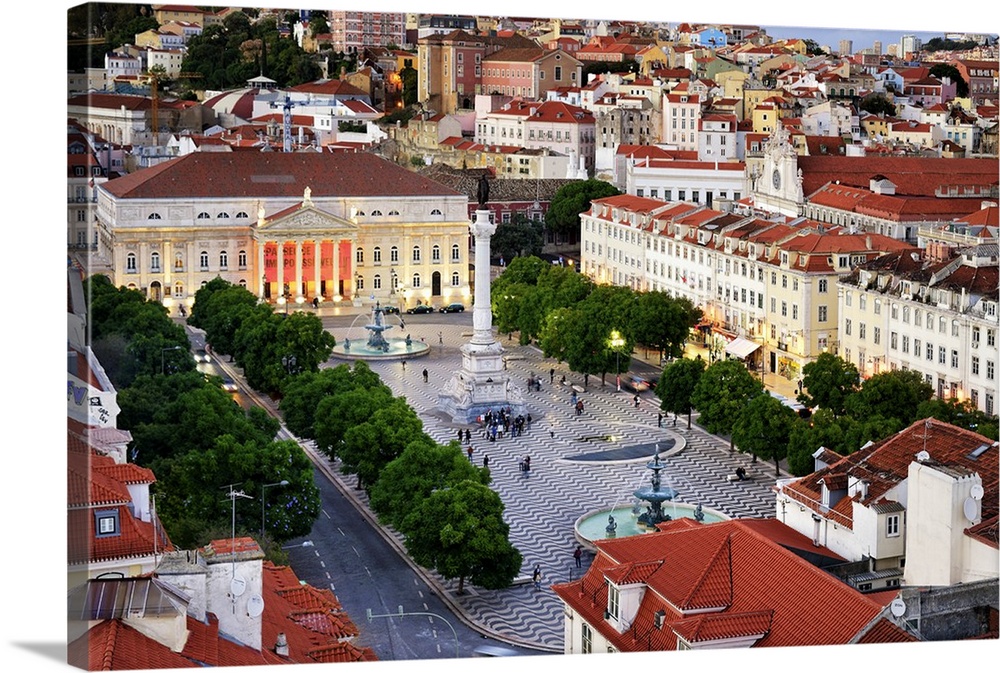 Rossio square or Praca Dom Pedro IV, the heart of the historic centre at twilight. Lisbon, Portugal.