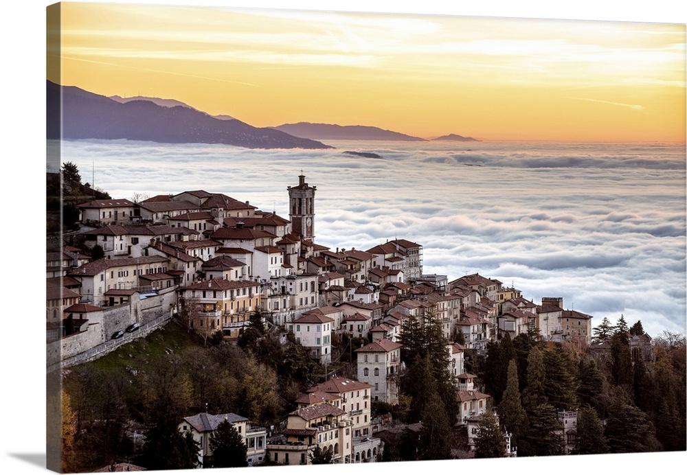 Sacro Monte of Varese and in background, the sea of fog during sunrise, Varese, Lombardy, Italy