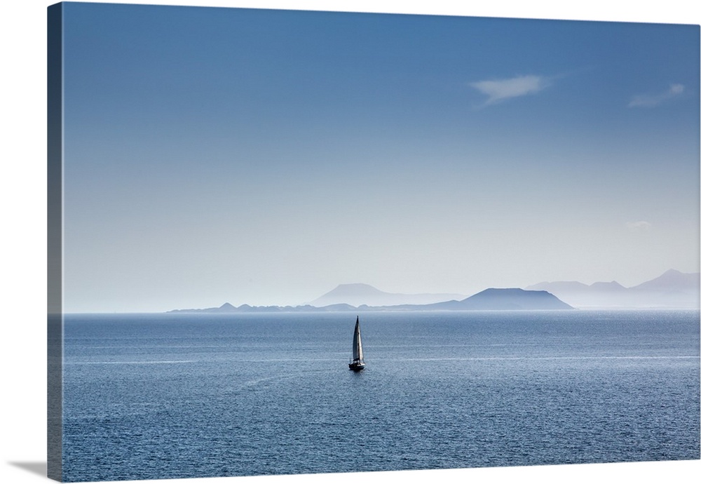 Sailing boat and Fuerteventura, from Playa Blanca, Lanzarote, Canary Islands, Spain