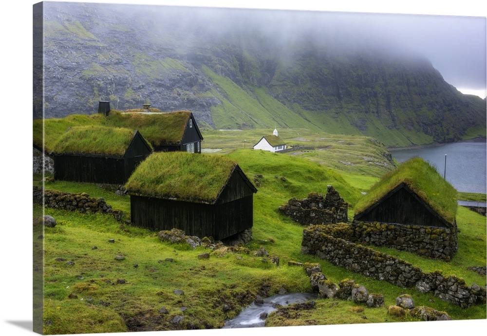 Saksun, Stremnoy island, Faroe Islands, Denmark. Iconic green roof houses.