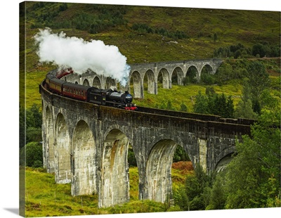 Scotland, Highlands, Jacobite Steam Train crossing the Glenfinnan Viaduct