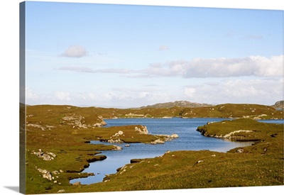 Scotland, Sea loch surrounded by machair on the wild east coast of the island