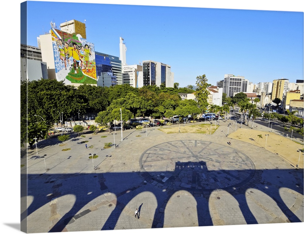 Brazil, City of Rio de Janeiro, Lapa, Shadow of the Tram crossing the Carioca Aqueduct casted on Largo da Lapa.