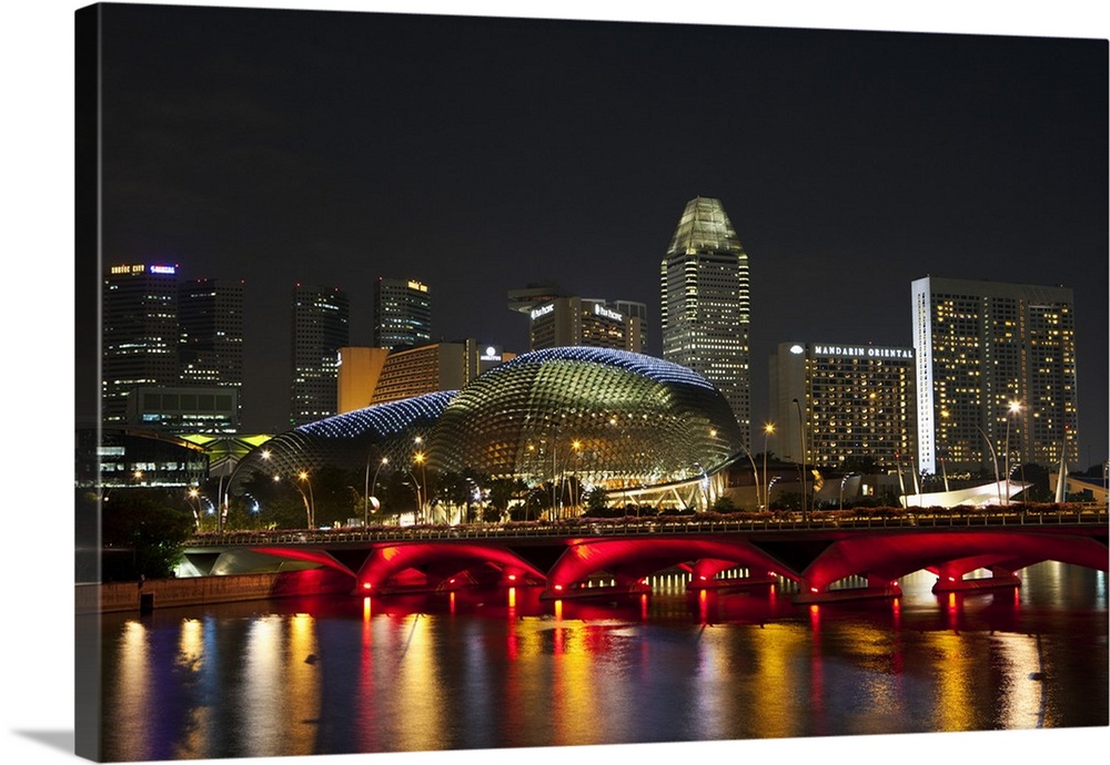 Singapore, Singapore, Esplanade. Esplanade Bridge and the Esplanade - Theatres on the Bay building illuminated at night.