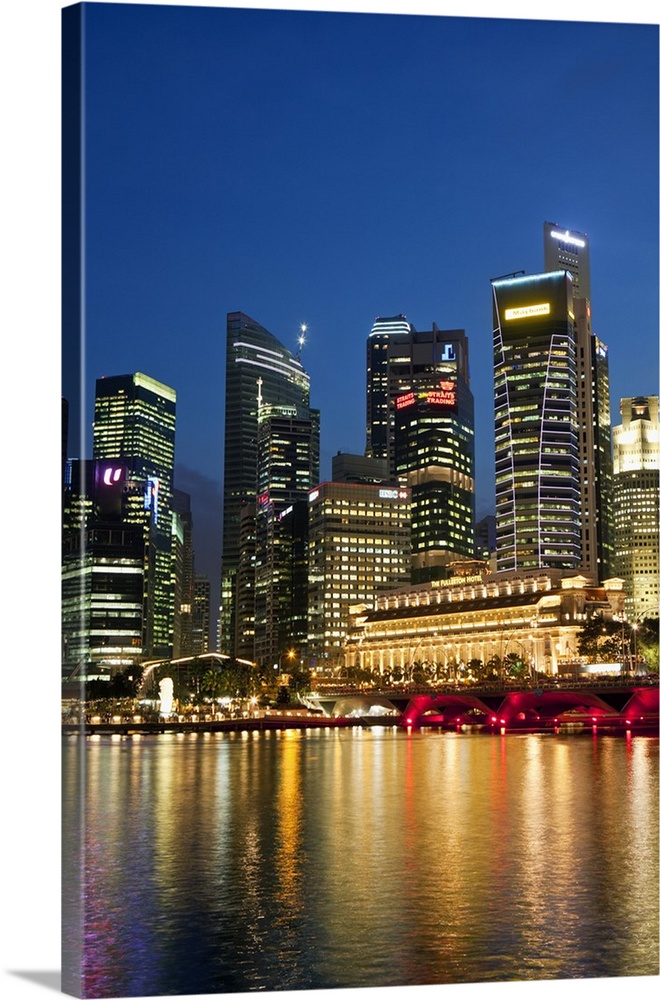 Singapore, Singapore, Marina Bay. The central business district skyline at dusk.