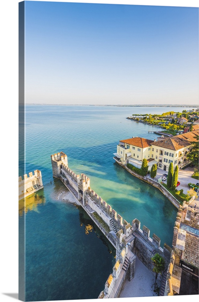 Sirmione, lake Garda, Brescia province, Lombardy, Italy. High angle view of the old town at sunset.