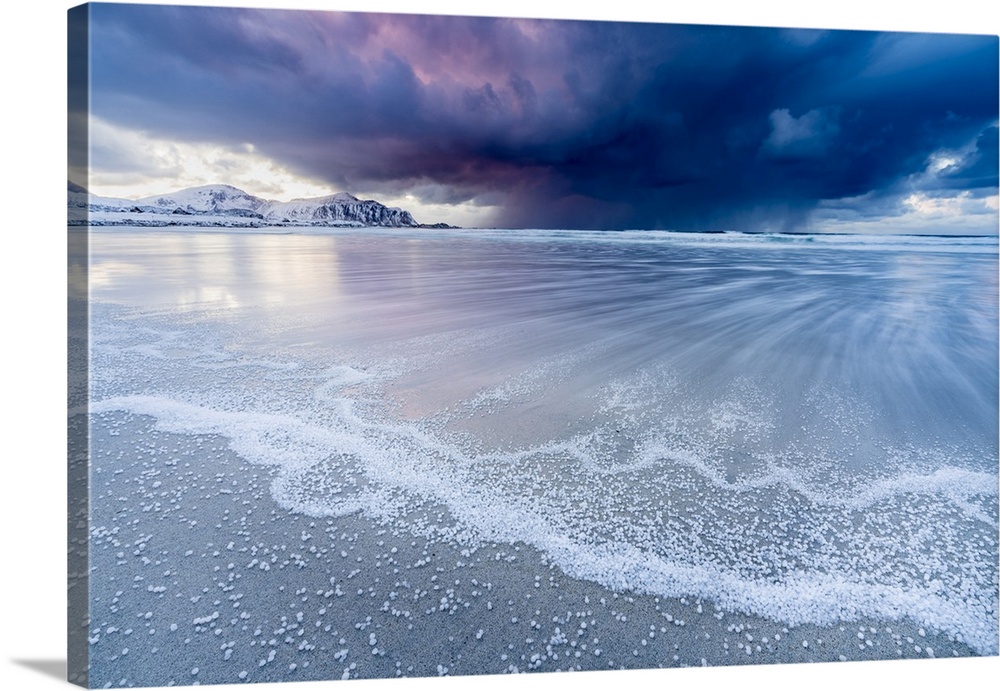 Skagsanden beach after a hailstorm at sunset, Flakstad, Nordland county, Northern Norway, Norway.