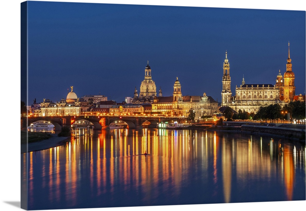 Skyline of Dresden at dusk with Bruehl's Terrace ,Academy of Fine Arts, Church of Our Lady, Court Church and  river Elbe, ...