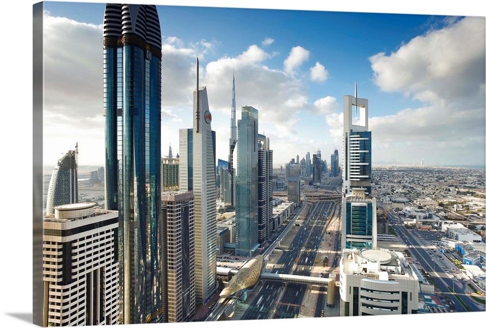 Skyscrapers along Sheikh Zayed Road looking towards the Burj Kalifa ...