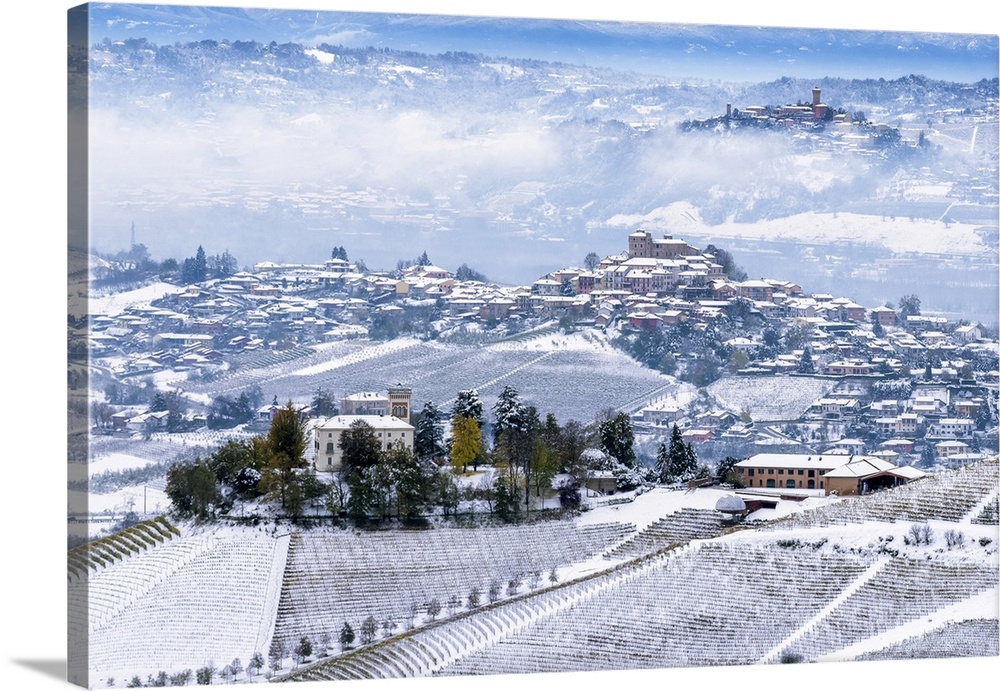 Snow on the three hills of Ceretto Wine, Roddi and Santa Vittoria d'Alba from Diano d'Alba, Piedmont, Italy