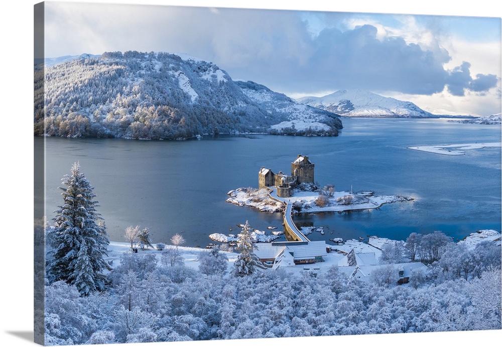 Snowy morning at Eilean Donan Castle on Loch Duich, Dornie, Western Highlands, Scotland, United Kingdom