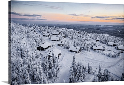 Snowy Mountain Huts In The Frozen Forest At Sunset, Lapland, Finland