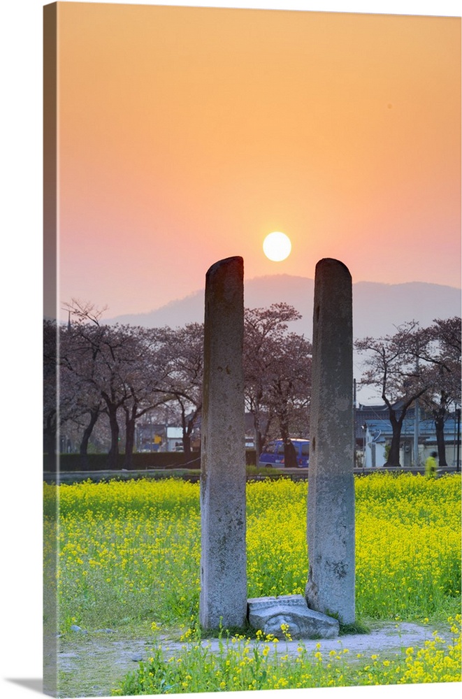 Asia, Republic of Korea, South Korea, Gyeongsangbuk-do, Gyeongju, sunset at ancient flagpole, UNESCO site.