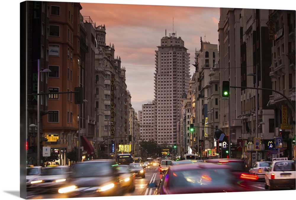 Spain, Madrid, Centro Area, Gran Via looking towards the Torre de Madrid and Plaza de Espana, dusk