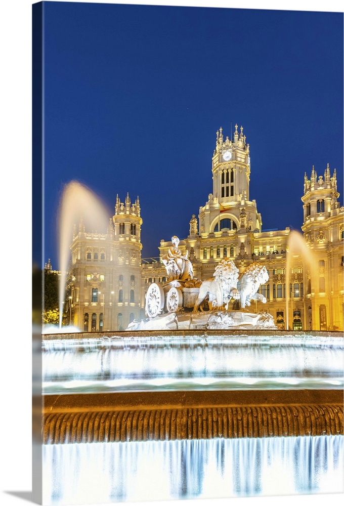 Spain, Madrid. Plaza de Cibeles with famous fountain and town hall building behind