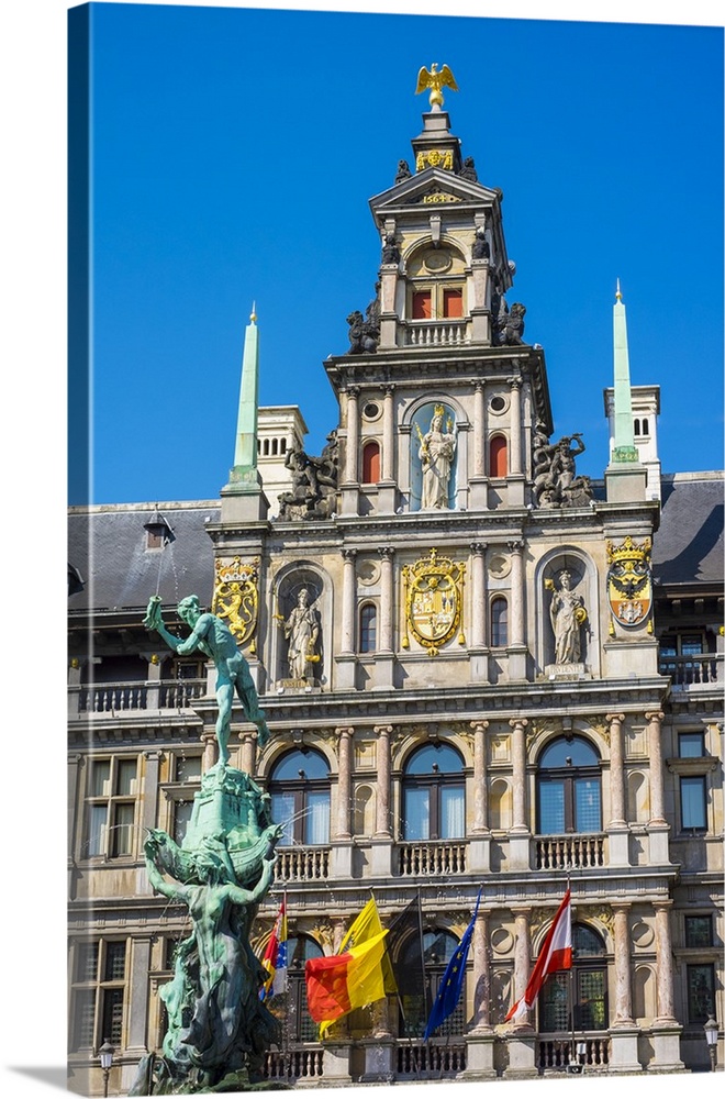 Belgium, Flanders, Antwerp (Antwerpen). Stadhuis city hall and statue of Silvius Brabo on Grote Markt square.