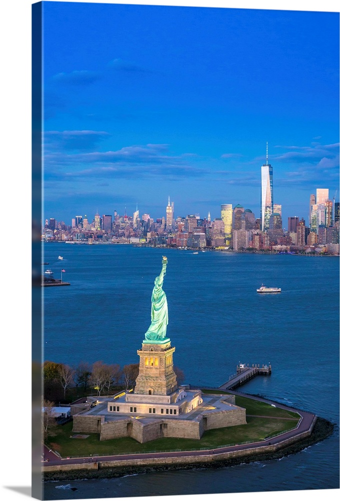Statue of Liberty and Lower Manhattan, New York City, New York, USA.