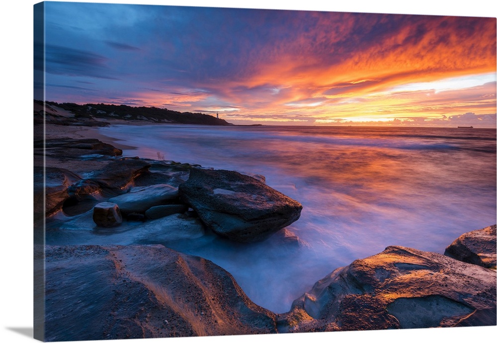 Stunning sunrise looking over to Norah Head Lighthouse. Gravelly Beach, Central Coast, New South Wales, Australia