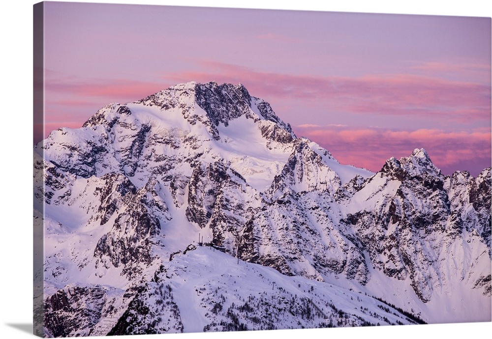 Sunrise on the Disgrazia mountain in winter, Malenco valley, Lombardy, Italy.