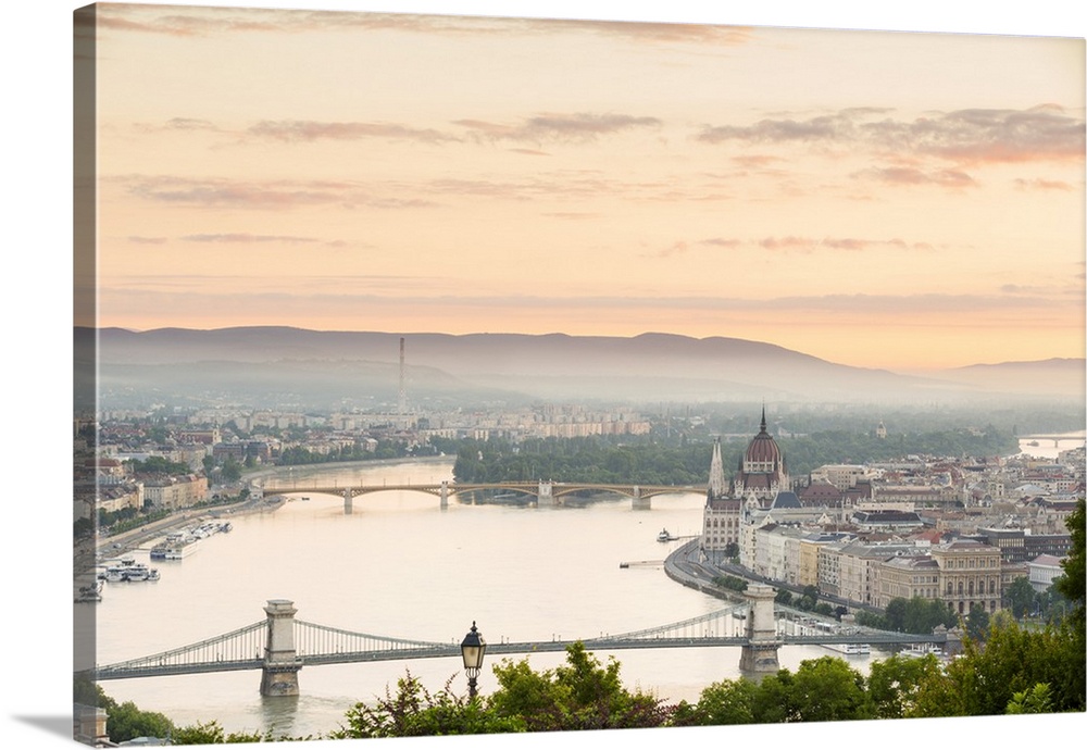 Hungary, Central Hungary, Budapest. Sunrise over Budapest and the Danube from Gellert Hill.