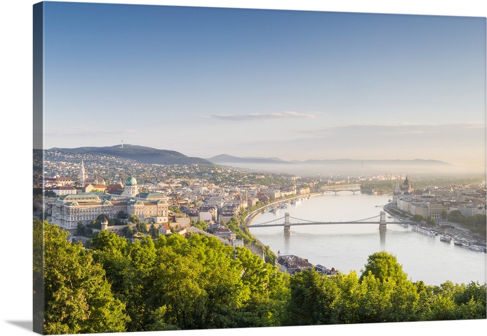 Hungary, Central Hungary, Budapest. Sunrise over Budapest and the Danube from Gellert Hill.