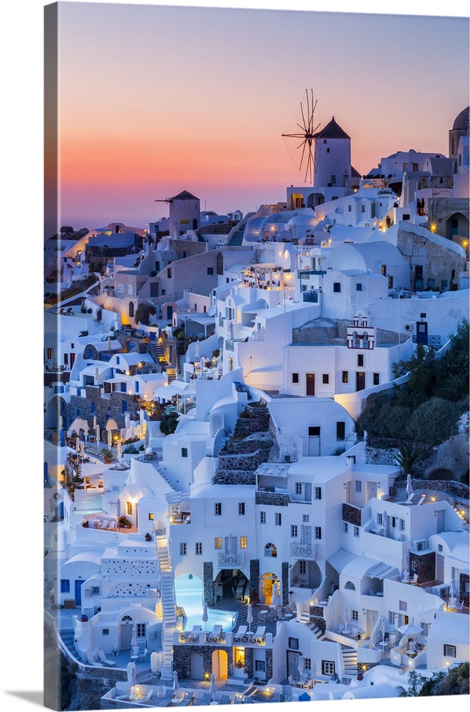 Sunset at the village of Oia in Santorini, Cyclades Islands, Greece.