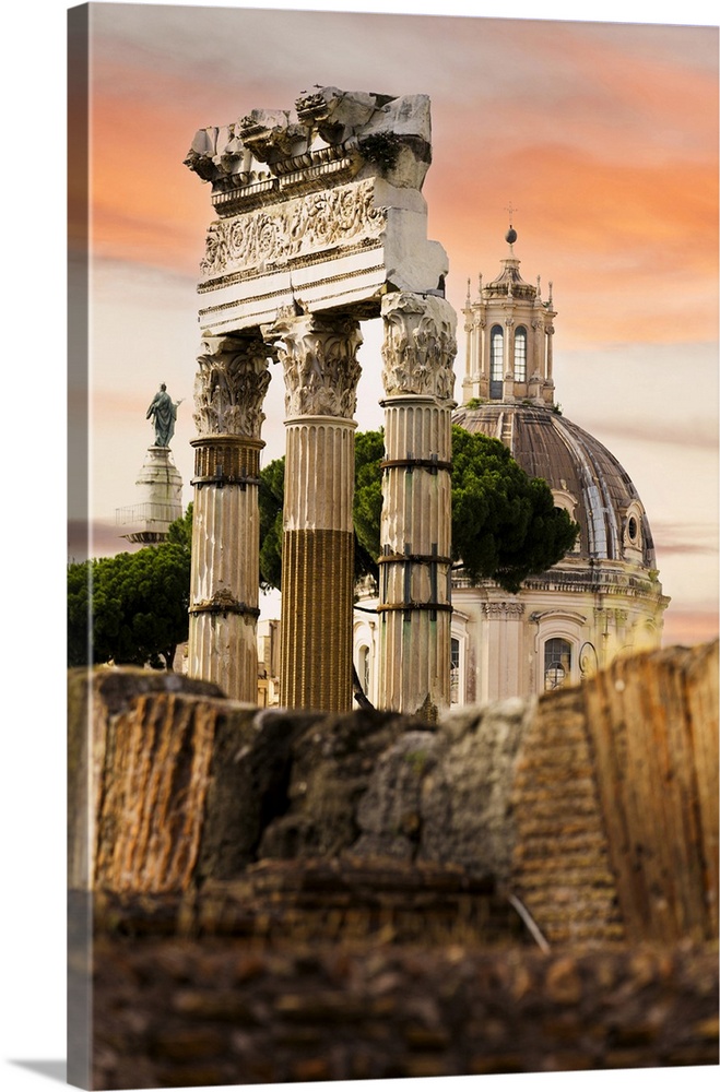 Sunset over an old dome of a church and Imperial Forums, Rome, Italy