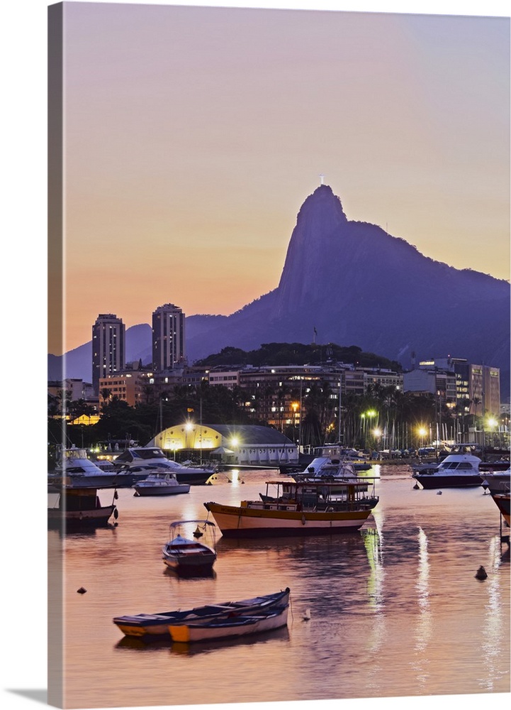 Brazil, City of Rio de Janeiro, Sunset over Botafogo Bay and Corcovado Mountain viewed from Urca.