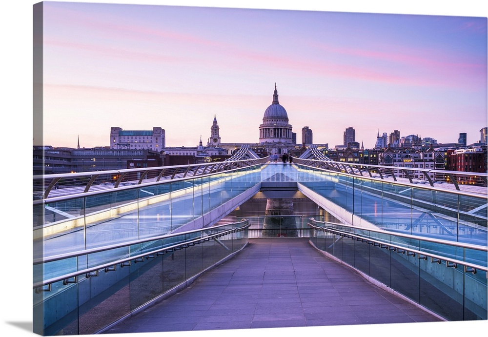 Sunset over the Millenium bridge and St Pauls Cathedral, London, England, UK