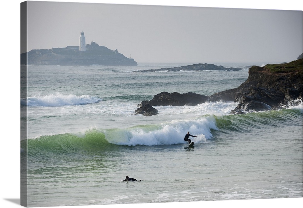 Surfers, St Ives Bay, Cornwall, England.