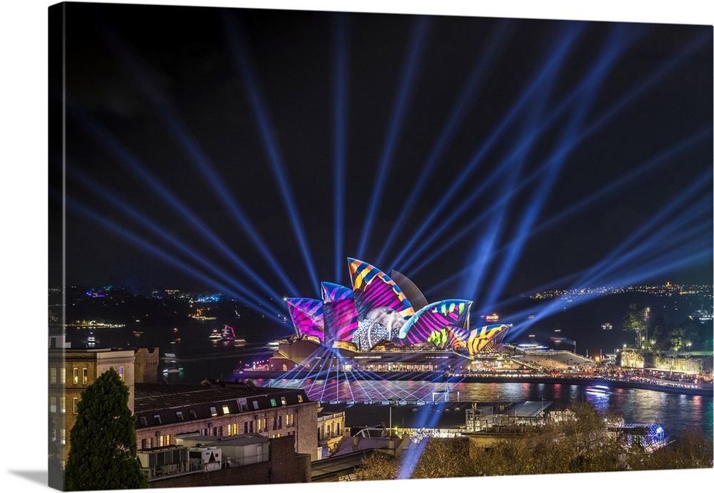 Sydney Opera House illuminated with lasers and projections during Vivid Sydney festival, Sydney, New South Wales, Australia.