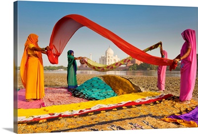 Taj Mahal, across Yamuna River, Women drying colourful Saris, India