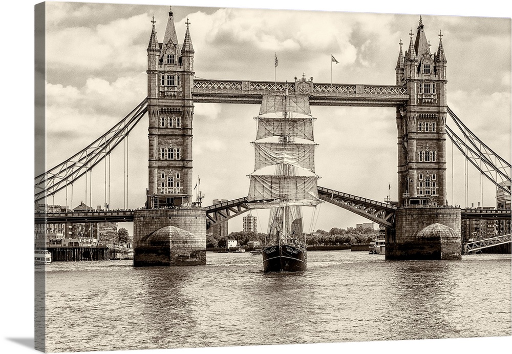 Tall Ship Thalassa passing through the Tower Bridge, London, England.