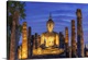 image thumbnail of Thailand, Sukhothai province, Sukhothai,UNESCO World Heritage site, Wat Mahathat illuminated at dusk.