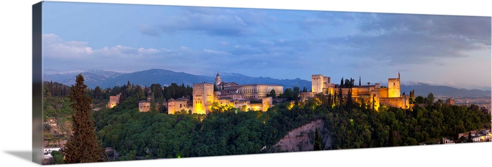The dramatic Alhambra Palace illuminated at dusk, Granada, Granada Province, Andalucia, Spain