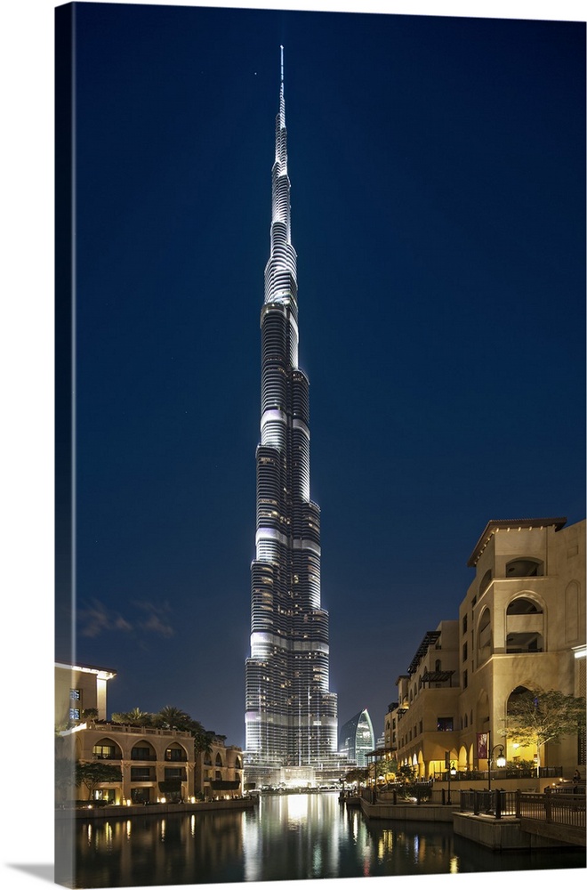 The Burj Khalifa (Armani Hotel) designed by Skidmore Owings and Merrill and the Souk Al Bahar at twilight, Business Bay, D...